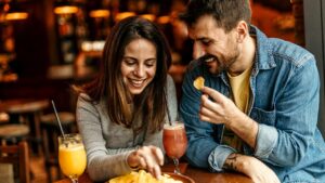 Drinking alcohol may influence cravings for certain foods in a surprising way, study suggests
