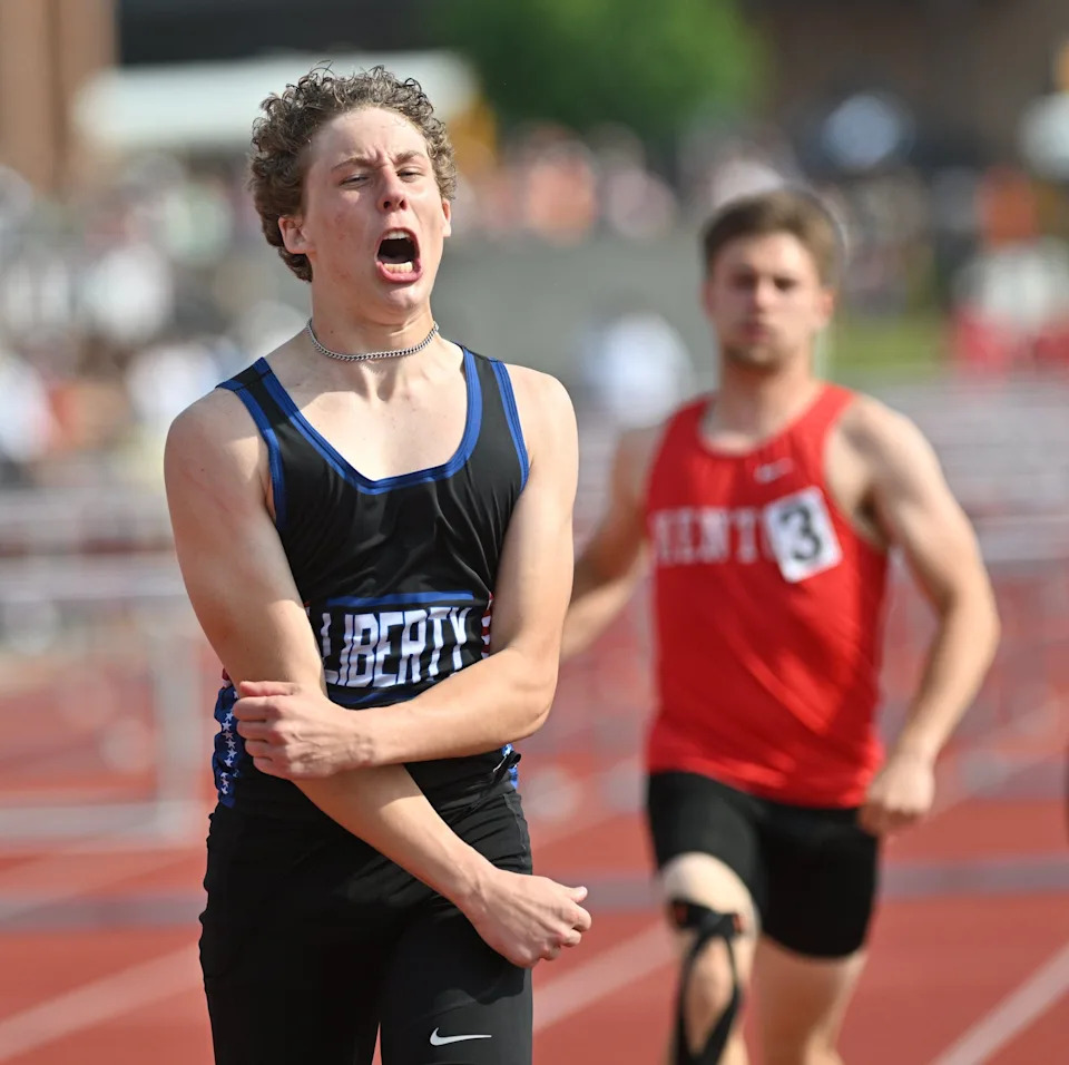Olentangy Liberty’s TJ Lichter celebrates his win in the 110-meter hurdles at the Division I state meet.