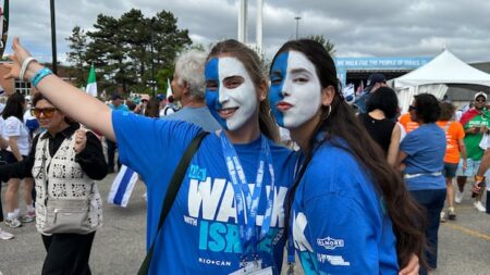 Walk with Israel event draws tens of thousands, police arrest 6