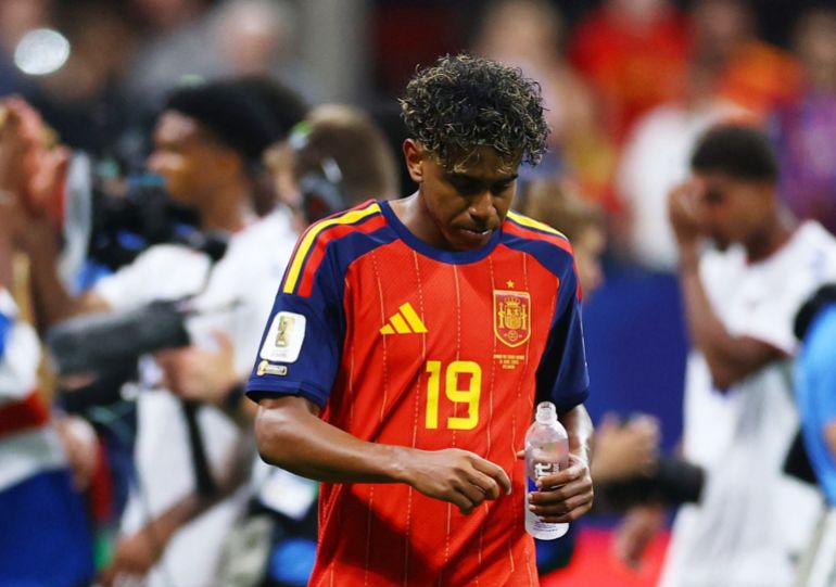 Spain's Lamine Yamal looks dejected after the match