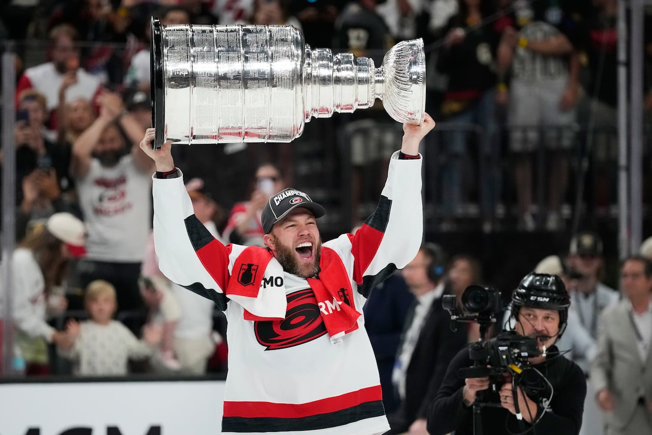 Carolina Hurricanes left wing Taylor Hall celebrates after a win over the Vegas Golden Knights in Game 6 of the NHL hockey Stanley Cup Final series, Sunday, June 14, 2026, in Las Vegas.
