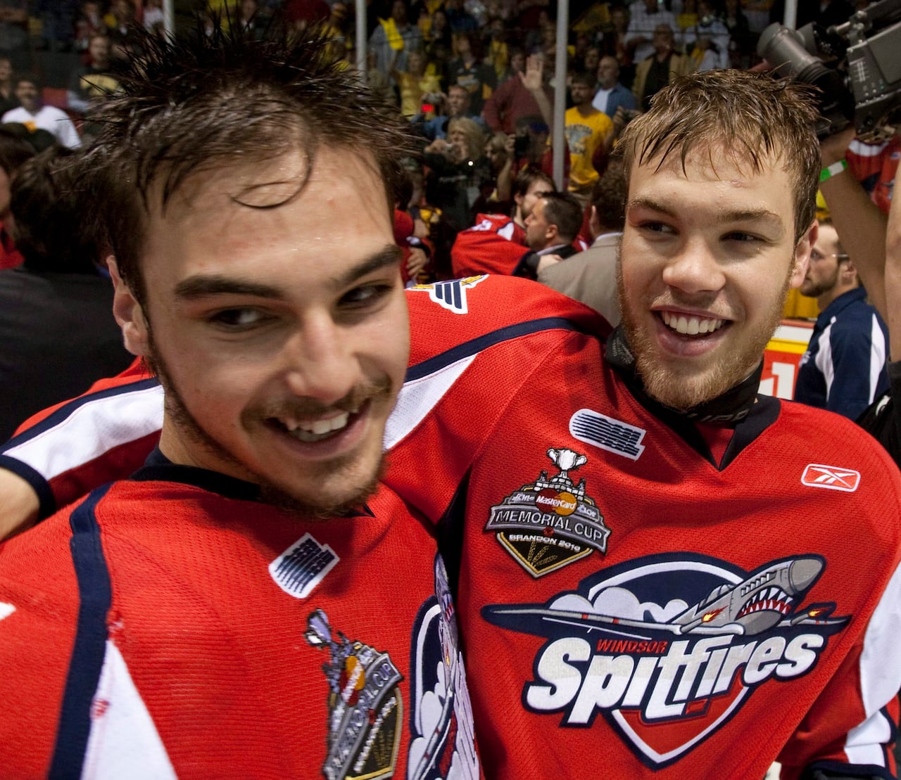 Windsor Spitfires Taylor Hall (right) and Eric Wellwood celebrate after defeating the Brandon Wheat Kings to win the Memorial Cup in Brandon, Manitoba on Sunday May 23, 2010.