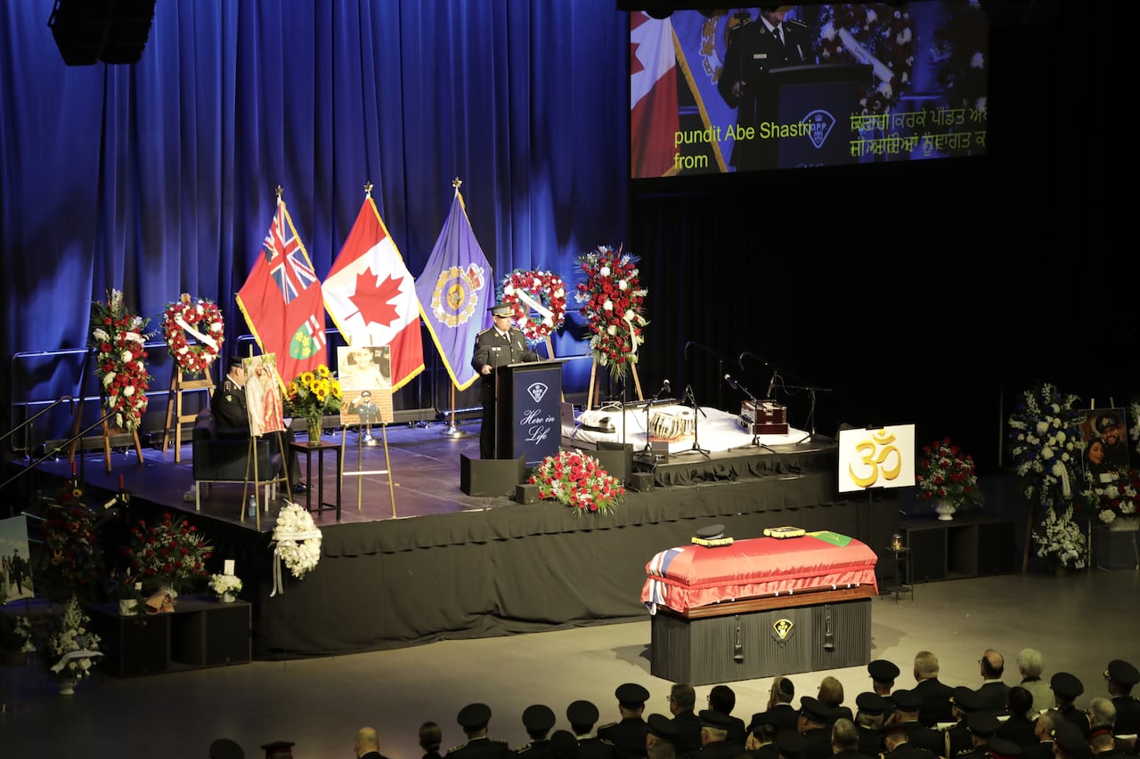 Casket at front of funeral service