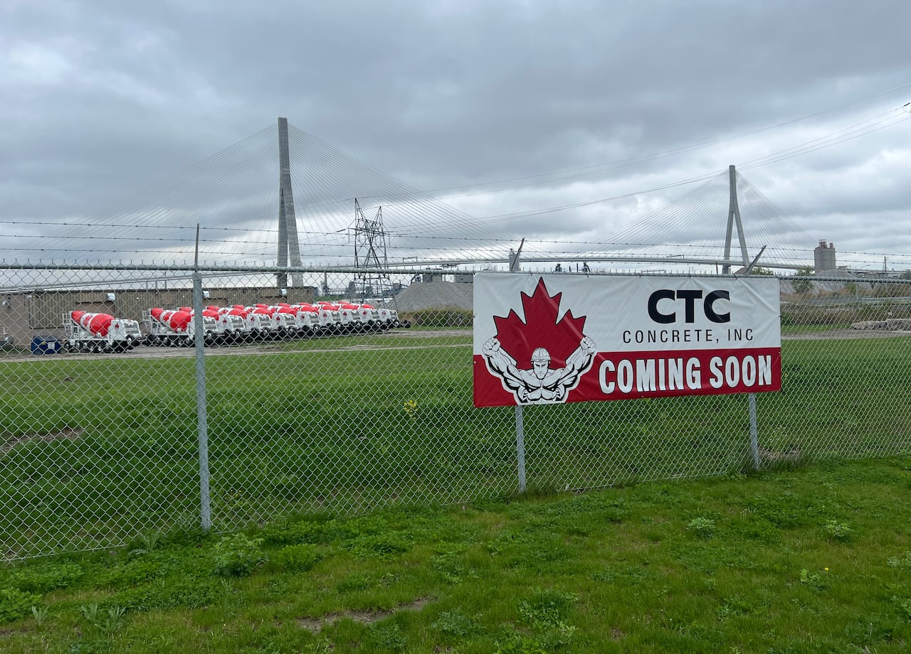 CTC Concrete coming soon sign with trucks in background
