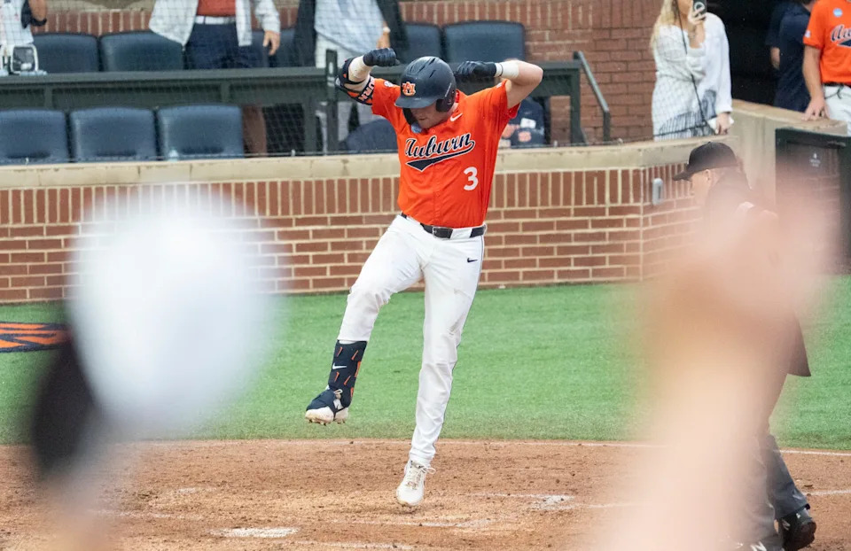 Auburn Tigers' Chase Fralick (3) celebrates his home run as Auburn Tigers take on UCF Knights during the NCAA Regional Baseball tournament at Plainsman Park in Auburn, Ala. on Sunday, May 31, 2026.