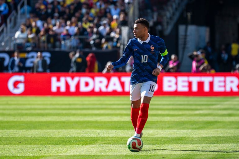 Mar 29, 2026; Landover, Maryland, USA; France forward Kylian Mbappe (10) move the ball up the field during the second of half an international friendly match against Colombia at Northwest Stadium. Mandatory Credit: Tommy Gilligan-Imagn Images