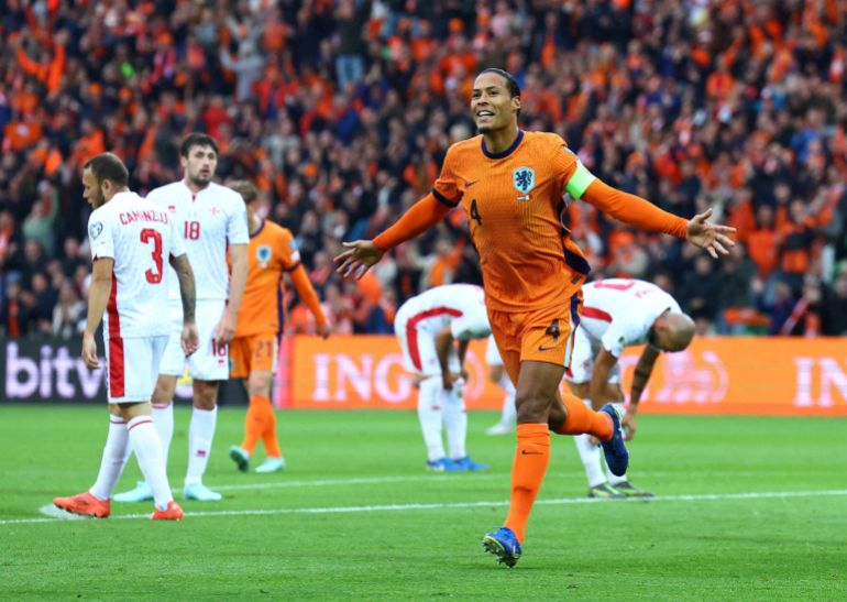 FILE PHOTO: Soccer Football - World Cup - European Qualifiers - Group G - Netherlands v Malta - Euroborg Stadion, Groningen, Netherlands - June 10, 2025 Netherlands' Virgil van Dijk celebrates scoring their third goal REUTERS/Piroschka Van De Wouw/File Photo