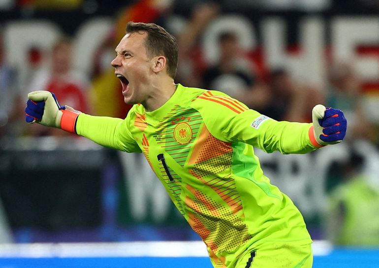 FILE PHOTO: Soccer Football - Euro 2024 - Round of 16 - Germany v Denmark - Dortmund BVB Stadion, Dortmund, Germany - June 29, 2024 Germany's Manuel Neuer celebrates after Jamal Musiala scores their second goal REUTERS/Kai Pfaffenbach/File Photo