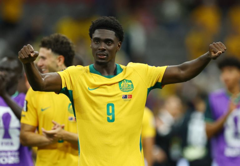 Australia's Mohamed Toure celebrates after the match