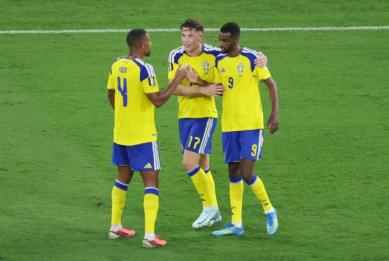 Sweden players celebrate together