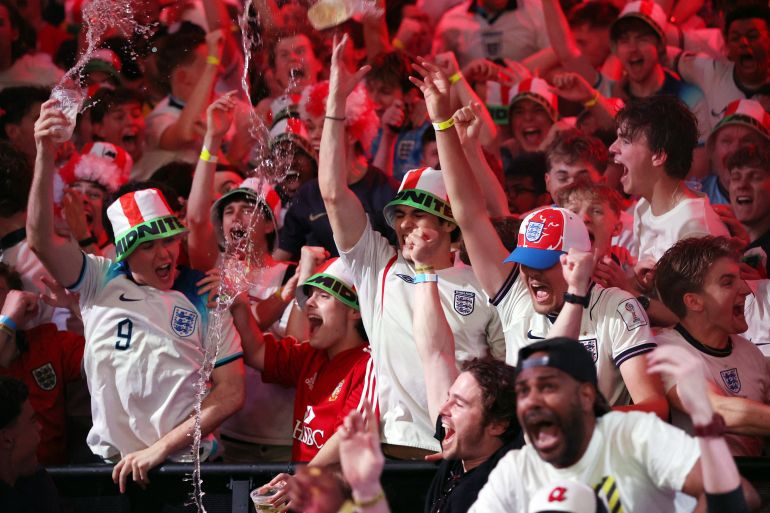 Soccer Football - FIFA World Cup 2026 - Group L - England v Croatia - Fans gather in London - BOXPARK Wembley, London, Britain - June 17, 2026 England fans in London celebrate after the end of the match REUTERS/Chris Radburn