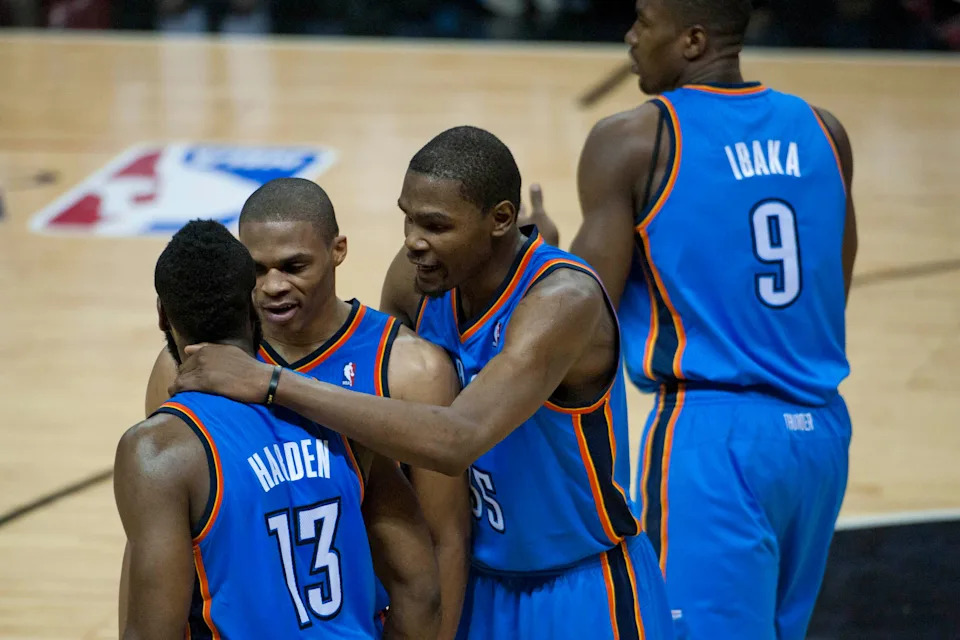 June 4, 2012; San Antonio, TX, USA; Oklahoma City Thunder forward Kevin Durant (35) and guards Russell Westbrook (center) and James Harden (13) react against the San Antonio Spurs during the second half in game five of the Western Conference finals of the 2012 NBA playoffs at the AT&T Center. Oklahoma City beat San Antonio 108-106. Mandatory Credit: Brendan Maloney-USA TODAY Sports