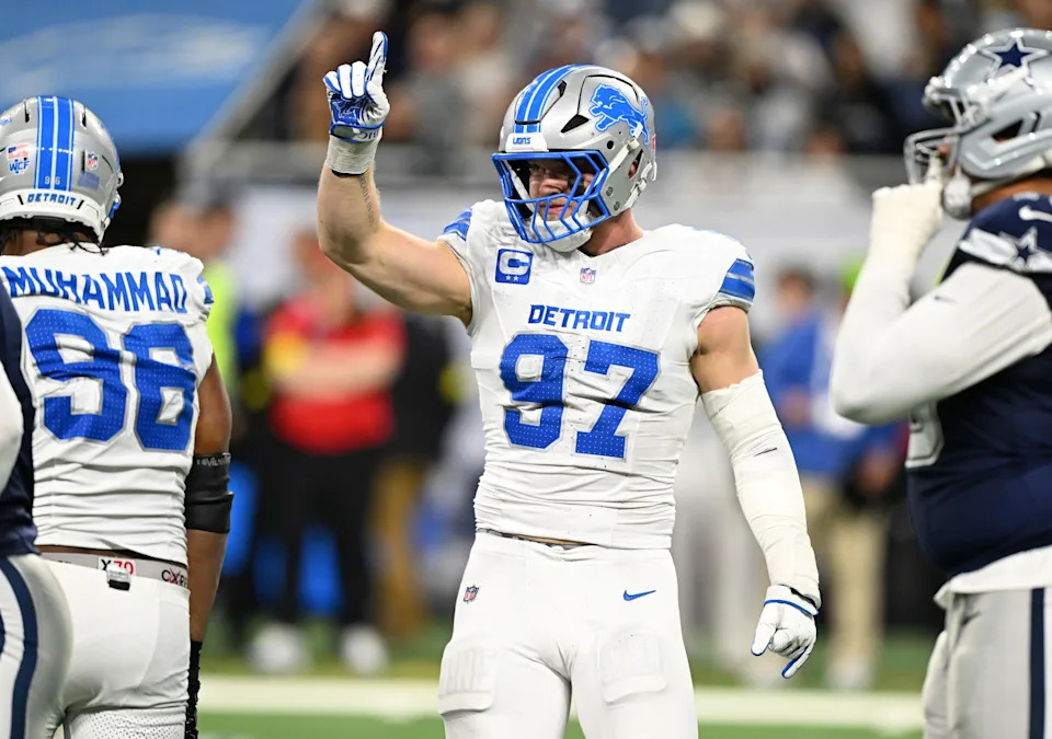 Dec 4, 2025; Detroit, Michigan, USA; Detroit Lions defensive end Aidan Hutchinson (97) reacts after a play during the second half against the Dallas Cowboys at Ford Field. Mandatory Credit: Lon Horwedel-Imagn Images