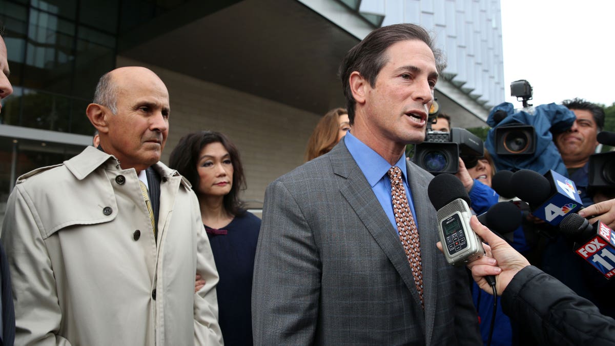 Nathan Hochman speaking to reporters in Los Angeles