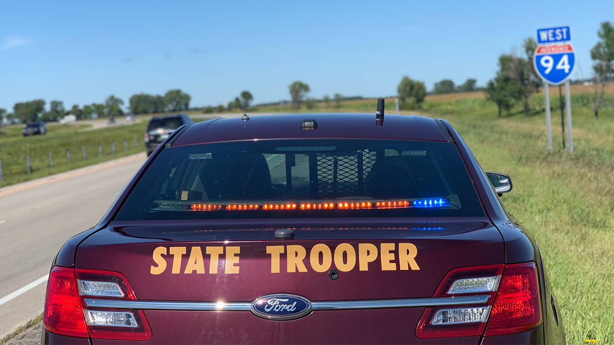 Minnesota State Patrol vehicle parked on an interstate highway