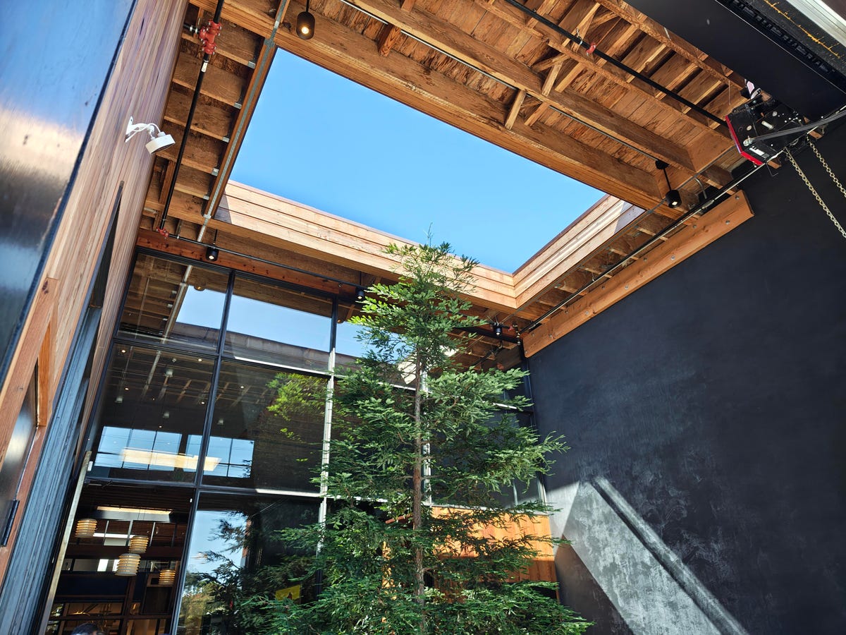 An atrium with a cutout in the roof