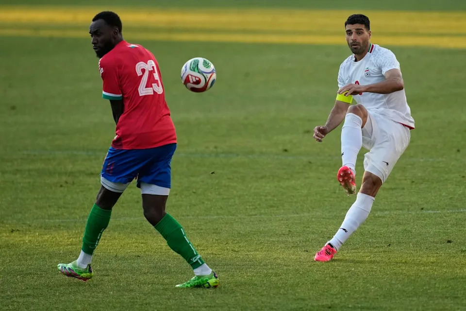 Olympiacos star Mehdi Taremi will lead the line for Iran at the World Cup (AP)