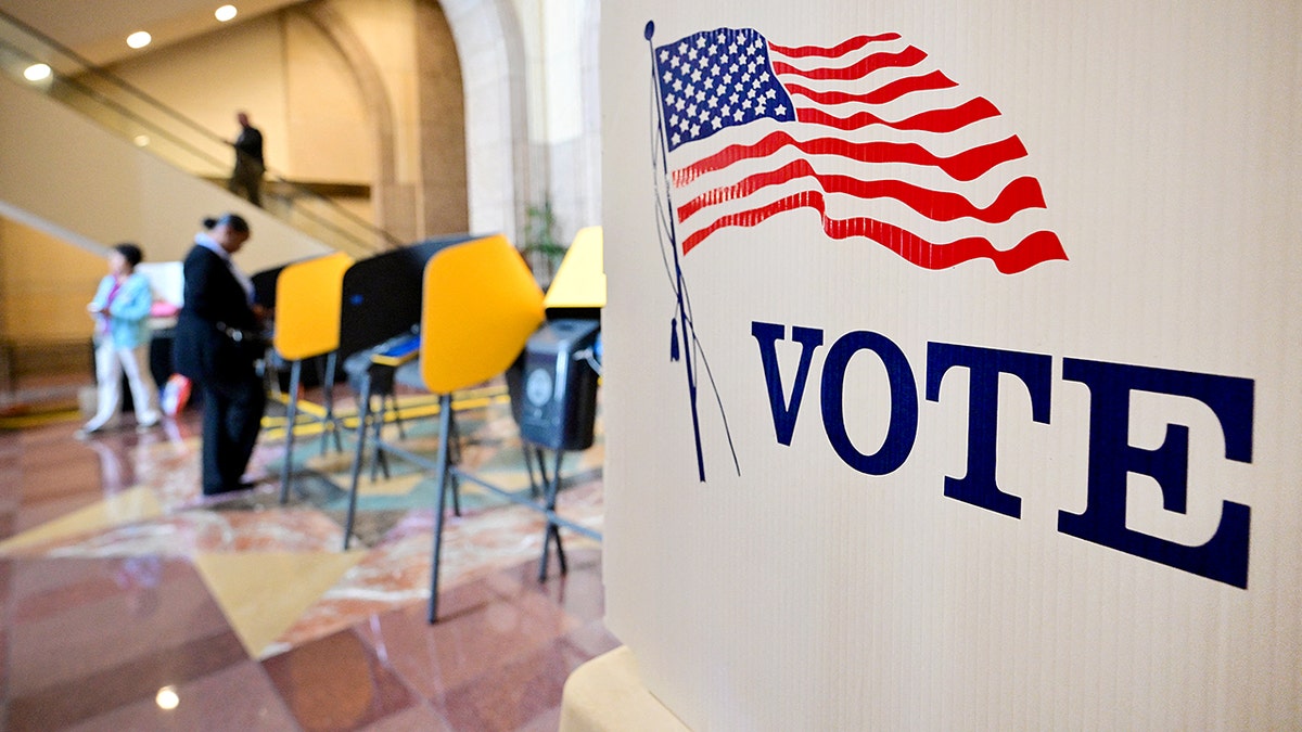 California voting booths arranged in a room
