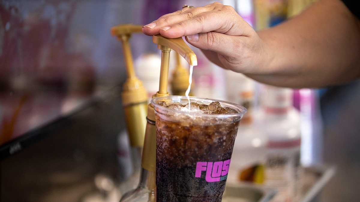 Karlee Flores making a dirty soda at Floso drink shop in Salem, Oregon