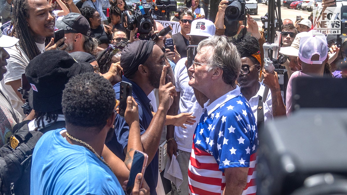 People outside of Collin County Courthouse react as news of a verdict is announced in the Karmelo Anthony murder trial in McKinney, Texas, Tuesday, June 9, 2026.