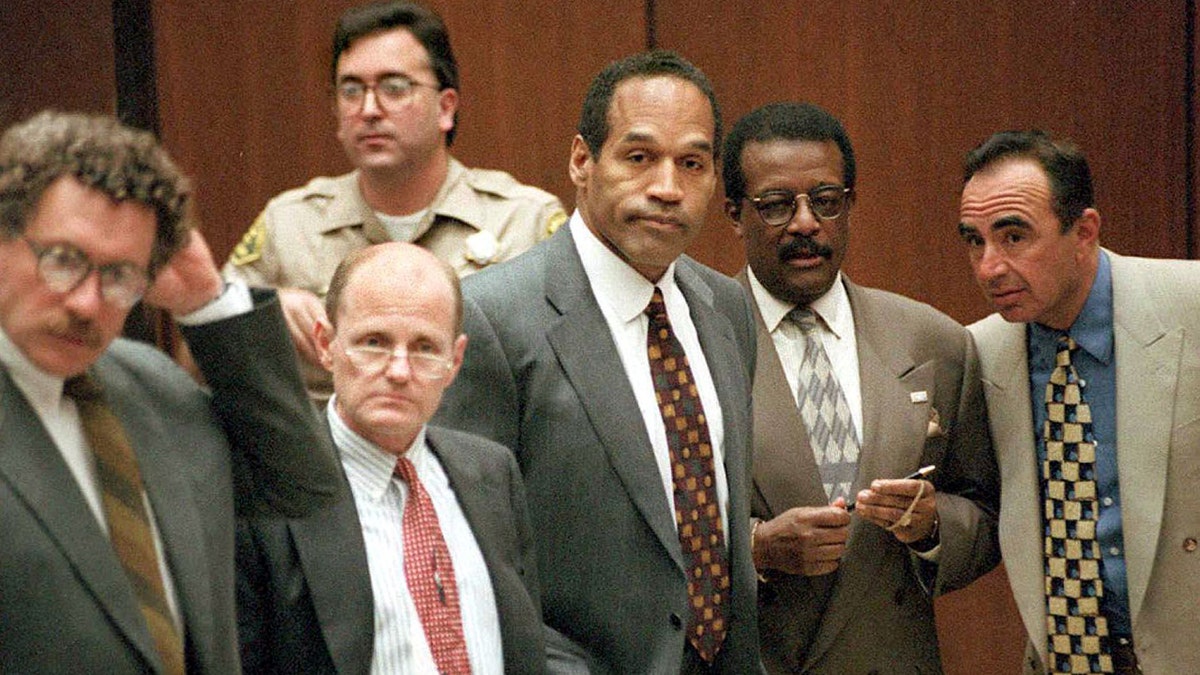 Johnnie Cochran, Robert Kardashian, Barry Scheck, F. Lee Bailey, Shapiro and Alan Dershowitz standing together during OJ Simpson trial