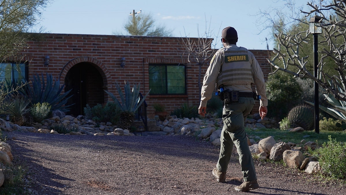 Investigators searching the grounds of Nancy Guthrie's property in the Catalina Foothills.