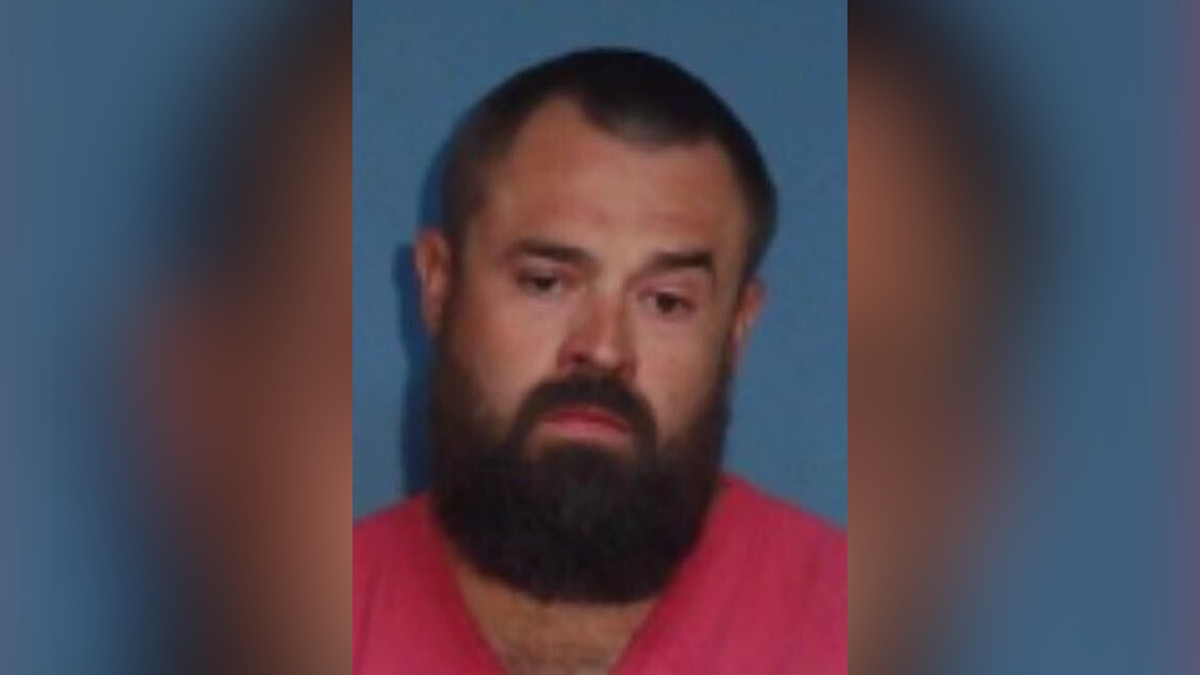 Aaron Spencer facing forward in a mugshot at Lonoke County Detention Center