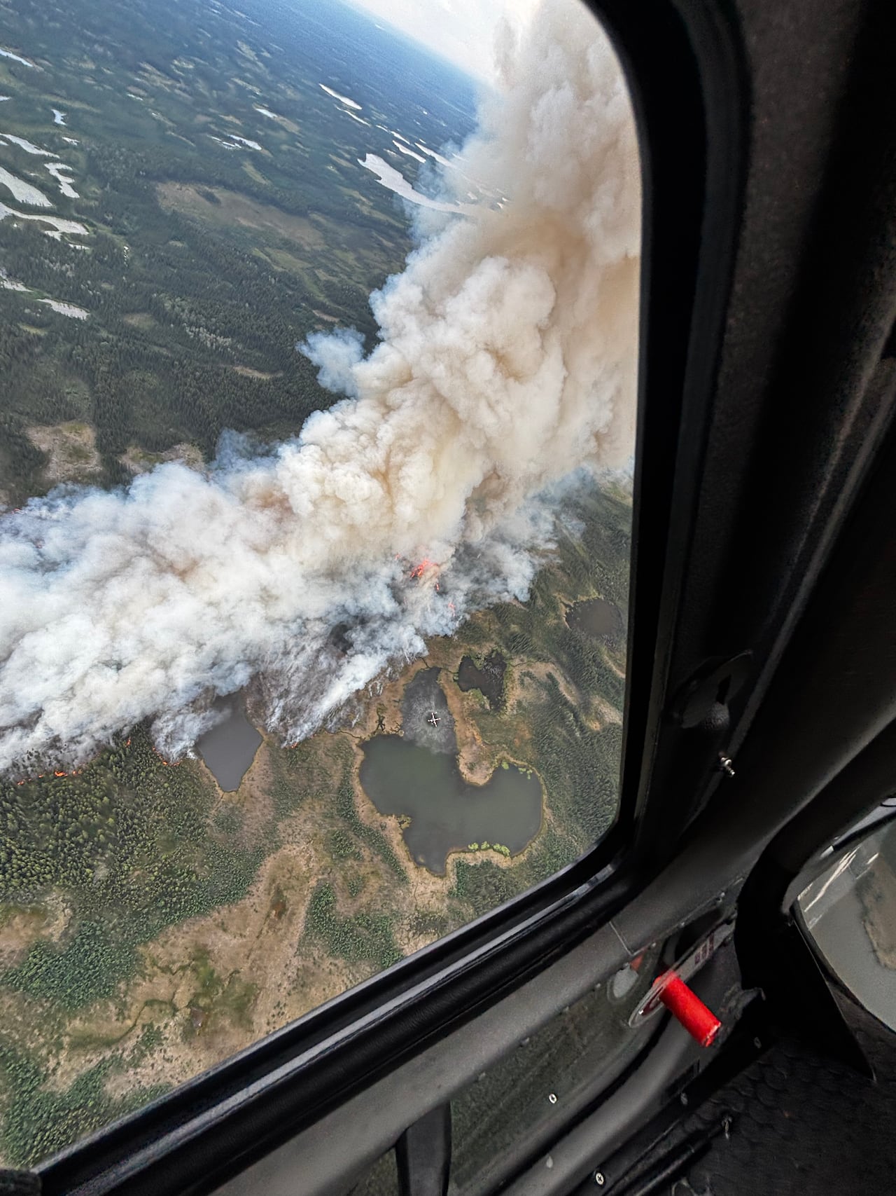 A view of FS016, a fire that prompted an evacuation alert for Fort Simpson, as seen from the air on June 27.