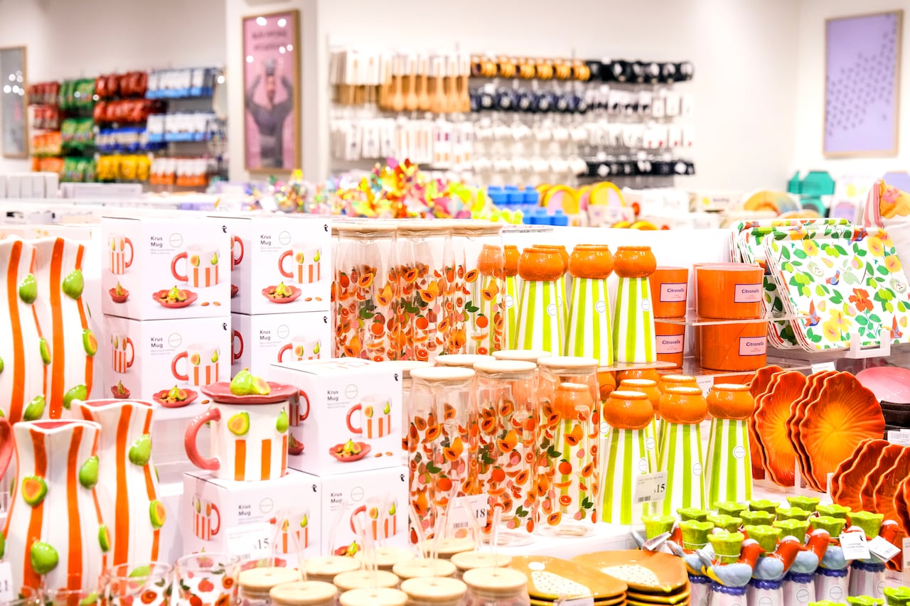 homewares in bright and pastel colours are on display in a brightly lit store