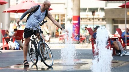 Sizzling temperatures and threat of storms blanket much of the country in weather warnings
