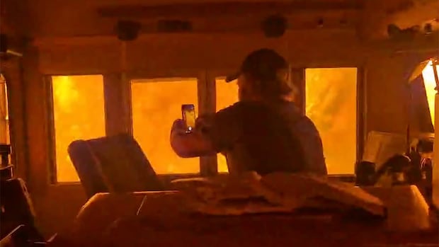 Government says it’s investigating CN’s actions after rail crew surrounded by wildfire