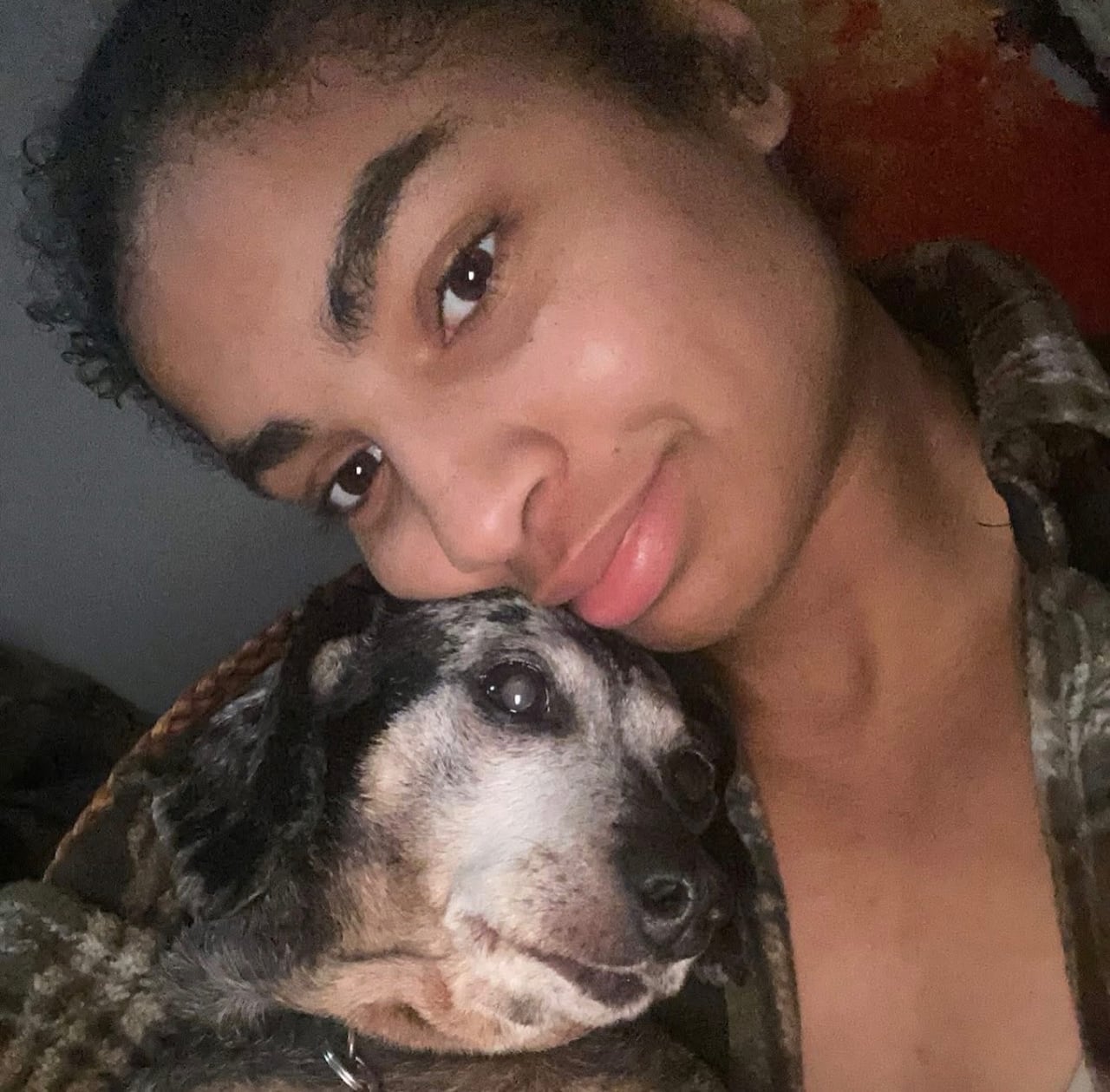 A woman with a dog.