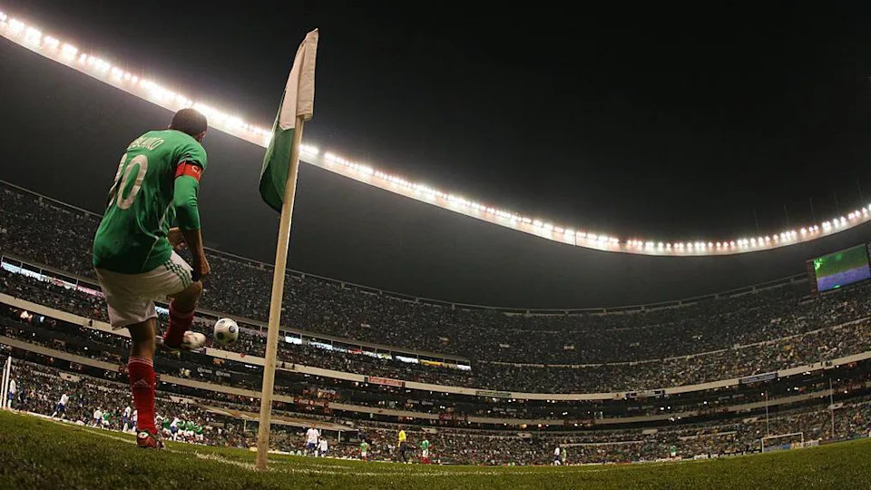 Cuauhtemoc Blanco takes a corner in front of a huge crowd at Estadio Azteca during a Mexico match