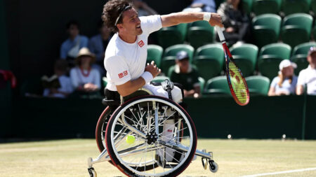 What is the difference between quad and wheelchair tennis?