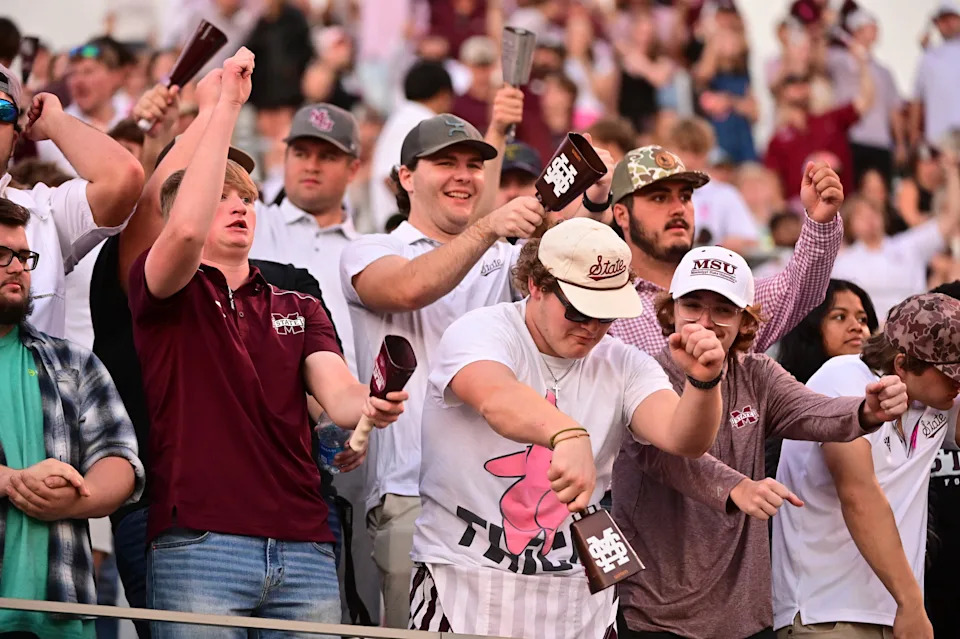 Oct 19, 2024; Starkville, Mississippi, USA; Mississippi State Bulldogs fans cheer during the fourth quarter against the Texas A&M Aggies at Davis Wade Stadium at Scott Field. Mandatory Credit: Matt Bush-Imagn Images