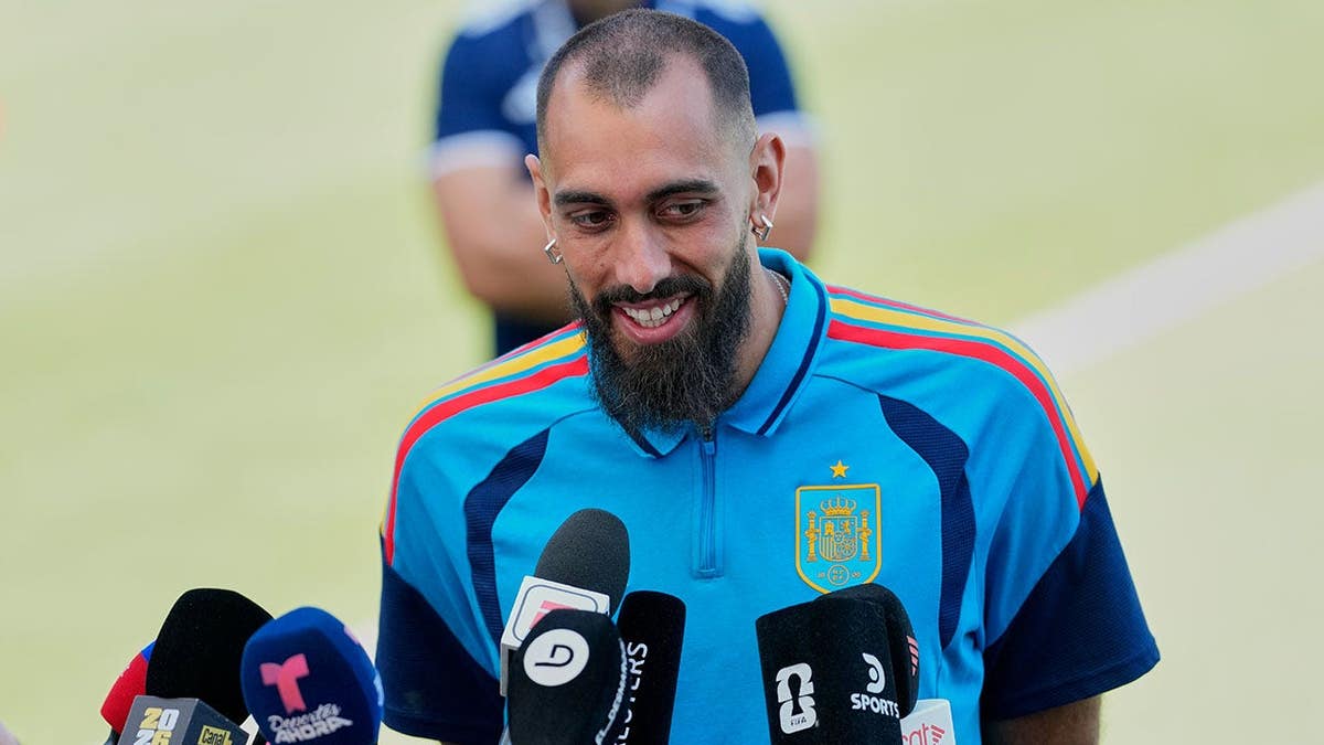Borja Iglesias talks with the media before a training session in Carson, Calif.