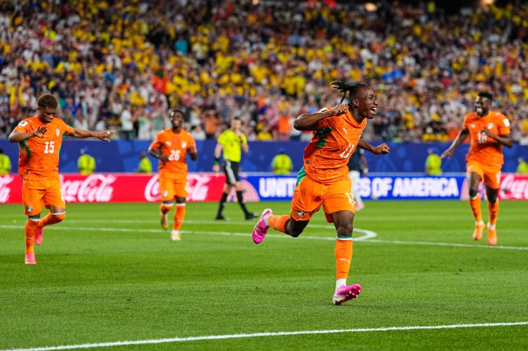Ivory Coast's Yan Diomande (11) celebrates after teammate Amad Diallo (15) scored their first goal during the World Cup Group E soccer match between Ivory Coast and Ecuador in Philadelphia, Sunday, June 14, 2026. (AP Photo/Petr David Josek)