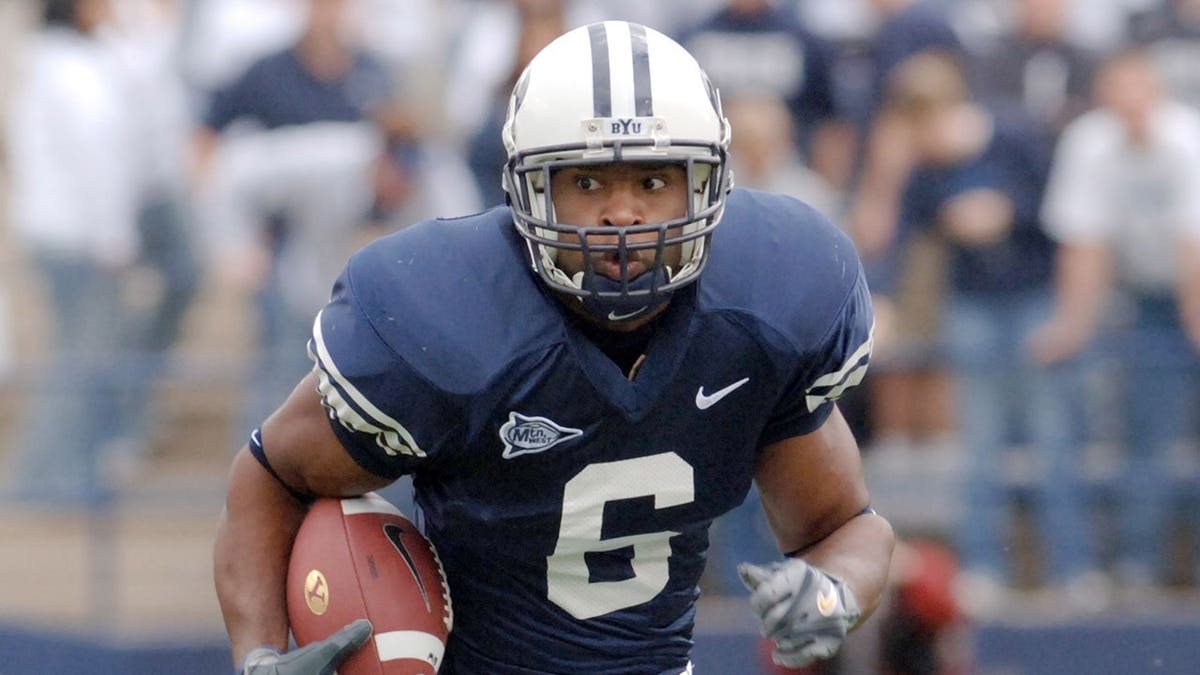 Curtis Brown, BYU running back, runs for yards against SDSU.