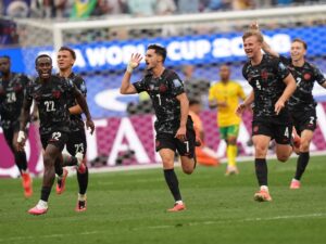 Canada score late to beat South Africa 1-0 and reach World Cup last 16