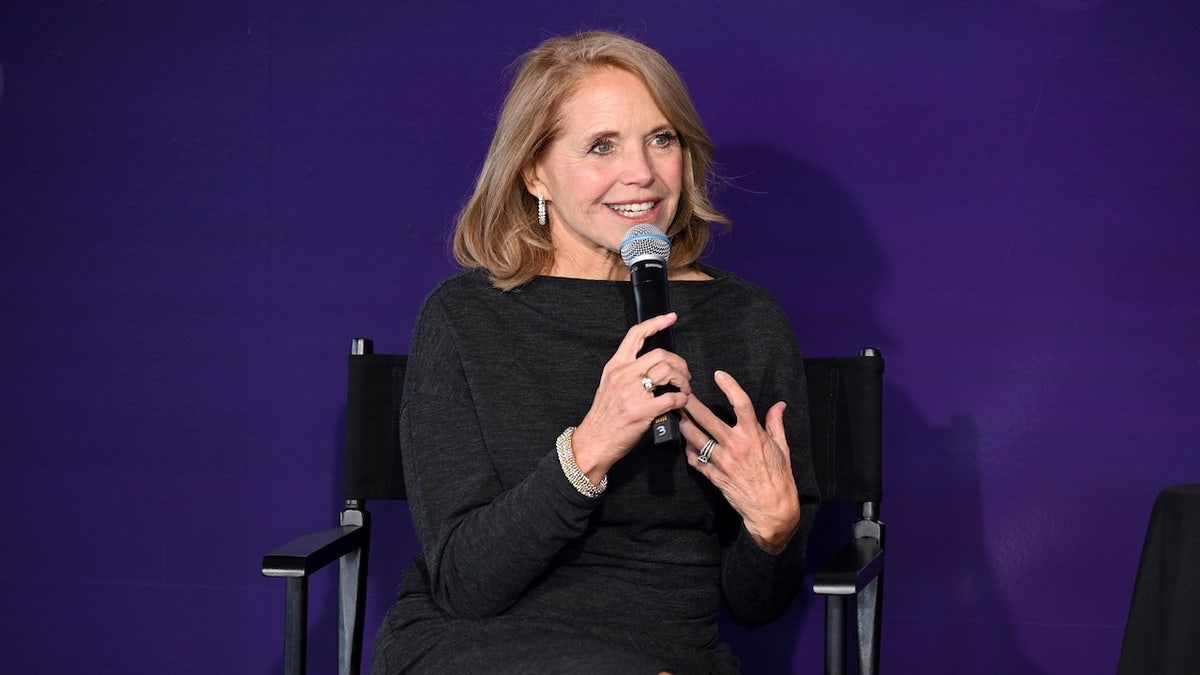 Katie Couric speaking on stage