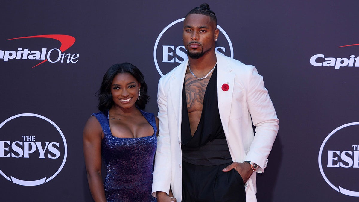 Jonathan Owens and Simone Biles