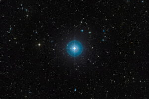 Faint new planet is found after cosmic hide-and-seek