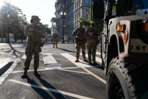 DC will pay $50,000 to man held in guard patrol Darth Vader protest