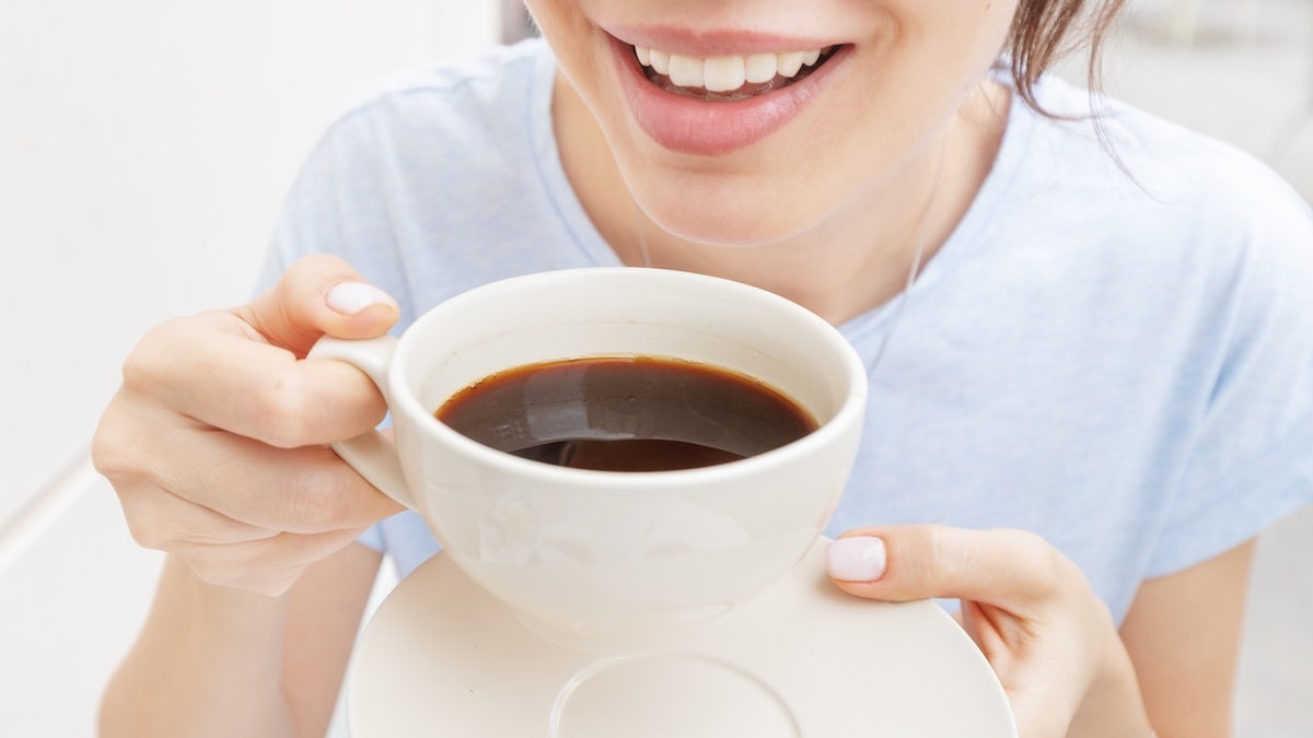Woman drinking coffee