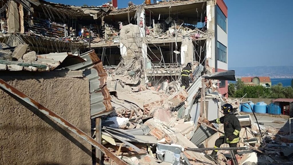Rescuers search for five after deadly Italian building collapse