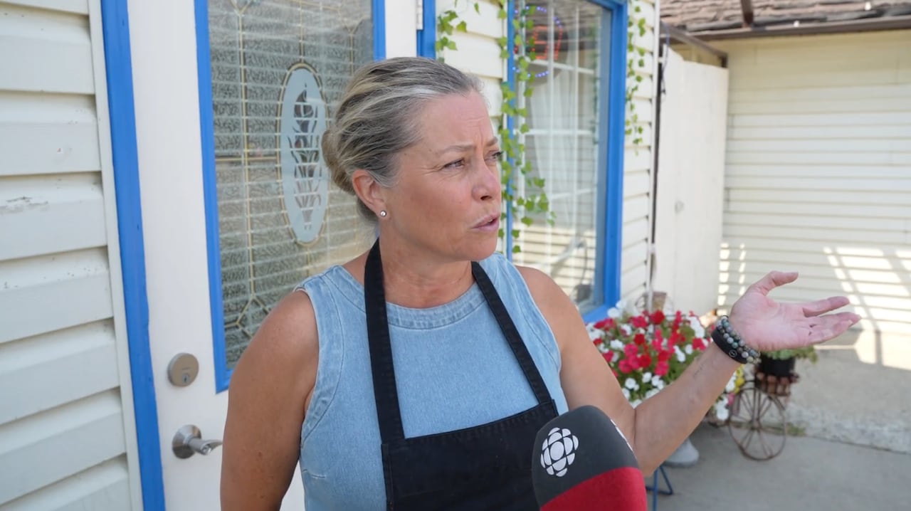 A woman speaks to a CBC reporter.