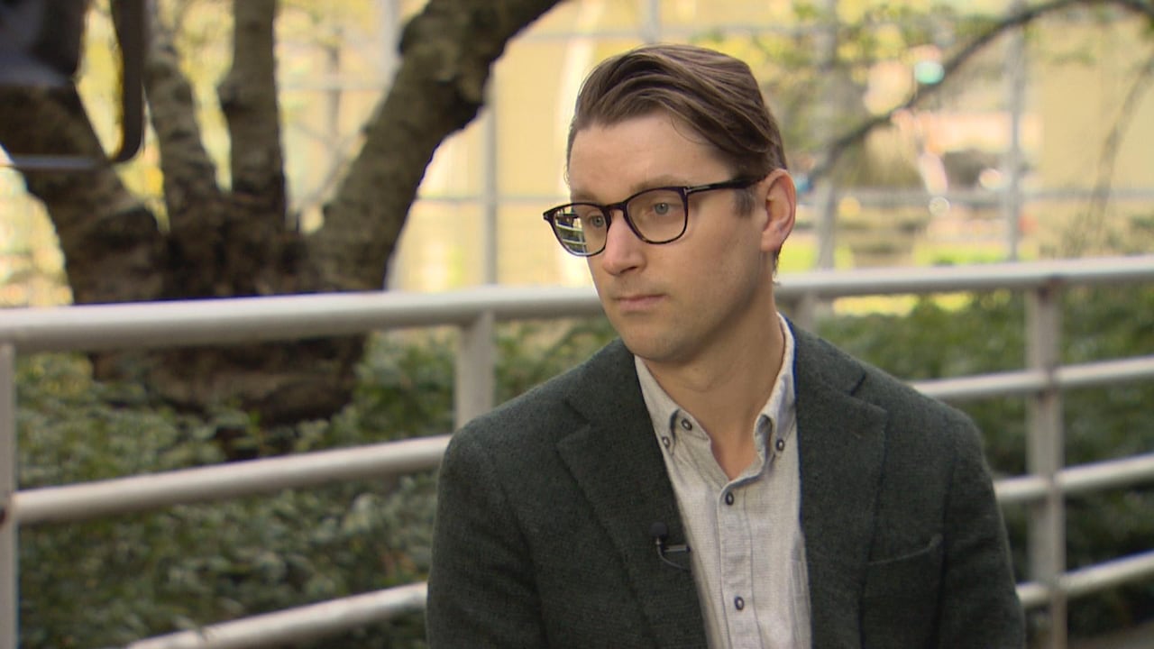 A man wearing glasses.