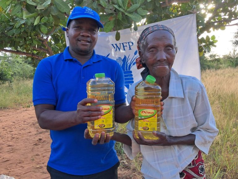 Flood survivors receive food assistance from the United Nations World Food Programme in Mozambique in April 2026. [WFP Mozambique]