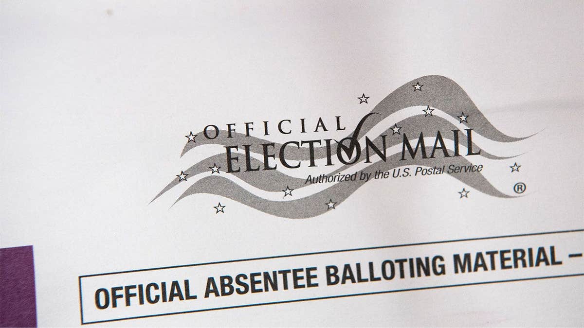 Absentee ballot for the 2020 U.S. election featuring the U.S. Postal Service official election mail logo