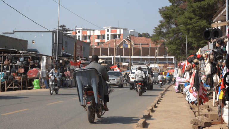 Traffic moves through Bunia’s busy market district, in the capital of Ituri Province in north-eastern Democratic Republic of the Congo [Prosper Heri/Al Jazeera]